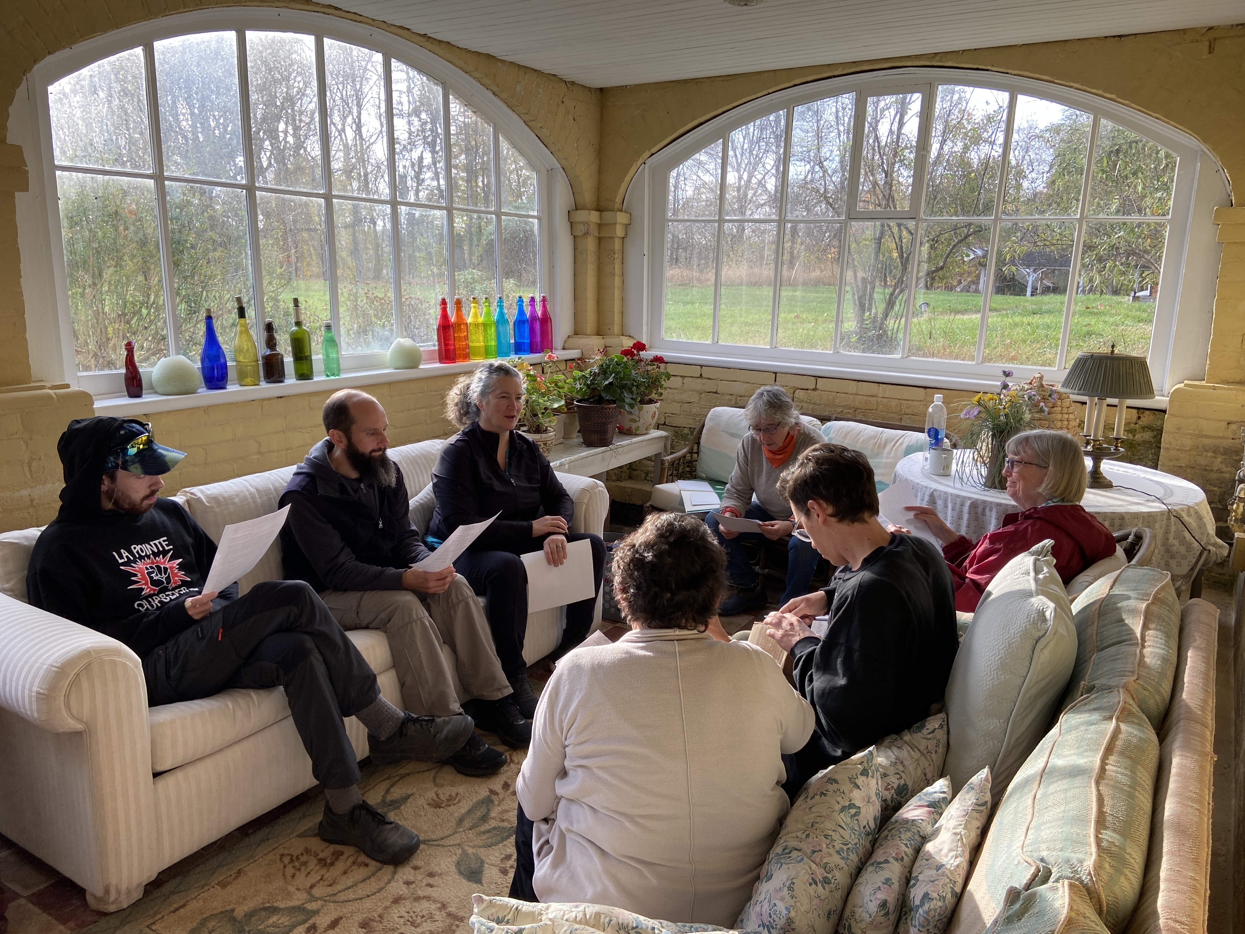 Course participants working together on a communal task at Claymont.