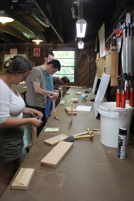Participants working on a building project at Claymont.